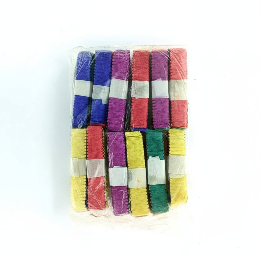 Packaged colorful ribbons in various colors on a white background